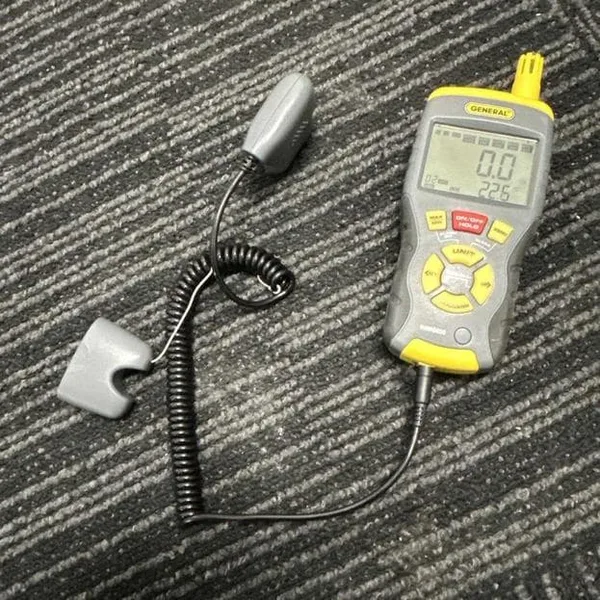 Moisture meter reading 0.0% on Day 5 of Park Hyatt Auckland water damage restoration
