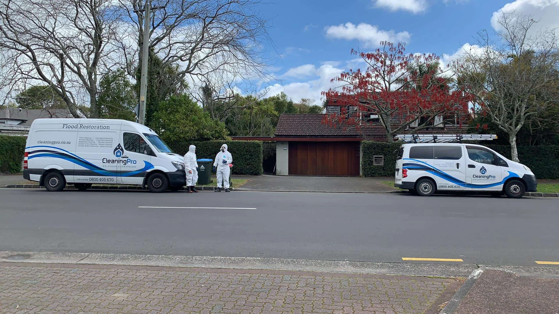 iDry restoration technicians and service vehicles ready for an Auckland call-out
